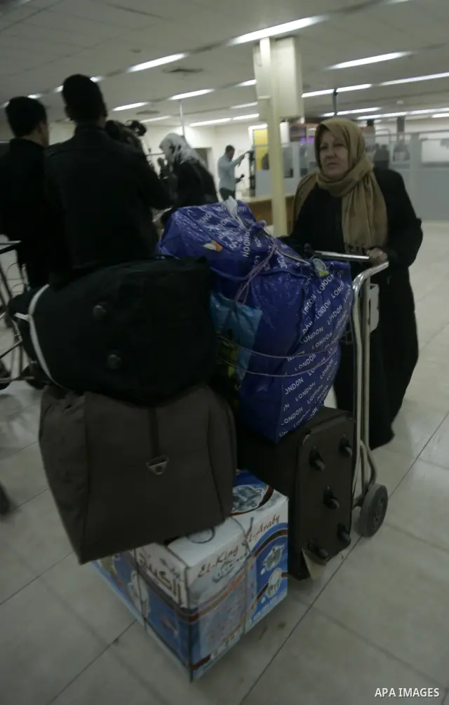 Palestinians returning from Egypt cross through the Rafah crossing on Feb. 19, 2011. The Egyptian authorities reopened the Rafah crossing on its border with the Gaza Stripe on Friday, the first time after the resignation...
