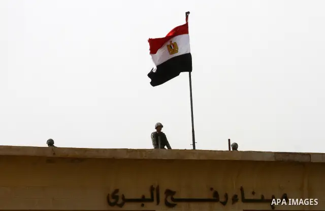 Egyptian soldiers stand guard at the Rafah crossing on Feb. 19, 2011. The Egyptian authorities reopened the Rafah crossing on its border with the Gaza Stripe on Friday, the first time after the resignation of President H...