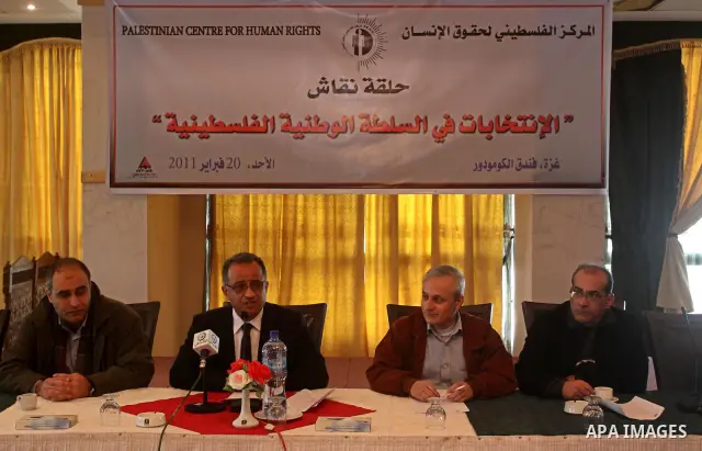 Palestinians attend a meeting to discuss the decision of the Palestinian Authority in the Palestinian elections, in Gaza City on Feb. 20, 2011. Photo by Mohammed Asad