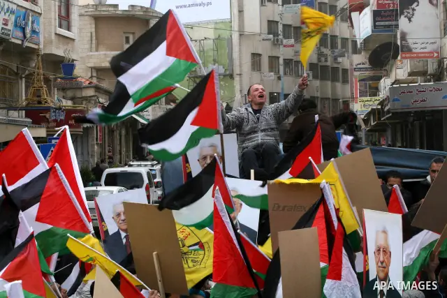 Palestinians demonstrate against the U.S. for vetoing the Arab-backed Security Council resolution against Jewish settlements, in the West Bank city of Ramallah, Sunday, Feb. 20, 2011. Palestinians with backing from much...