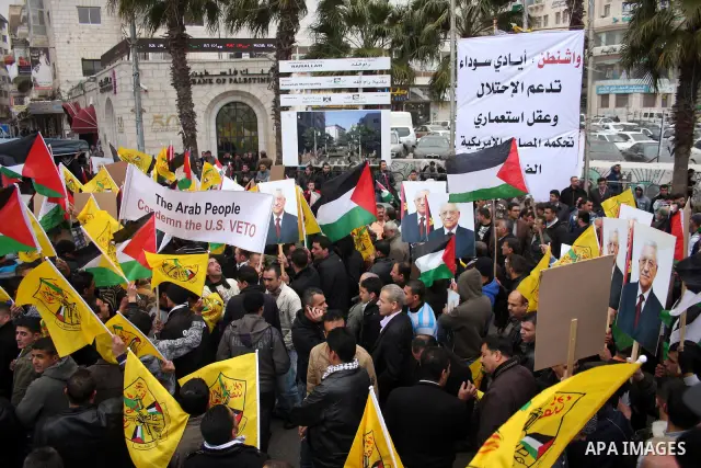 Palestinians demonstrate against the U.S. for vetoing the Arab-backed Security Council resolution against Jewish settlements, in the West Bank city of Ramallah, Sunday, Feb. 20, 2011. Palestinians with backing from much...