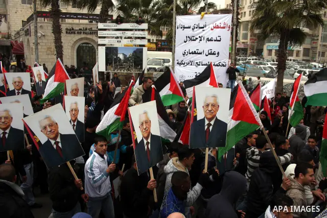 Palestinians demonstrate against the U.S. for vetoing the Arab-backed Security Council resolution against Jewish settlements, in the West Bank city of Ramallah, Sunday, Feb. 20, 2011. Palestinians with backing from much...