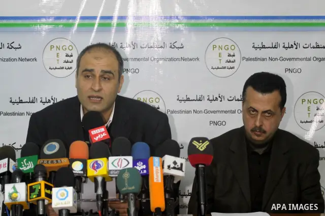 Palestinians from NGOs attend a press conference, in Gaza city on Feb. 21, 2011.. Photo by Mohammed Asad