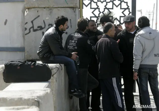 Palestinians arrive to the Gaza Strip through the Rafah border crossing with Egypt, in southern Gaza, on February 22, 2011 after it was opened for passage for people leaving and entering the Palestinian enclave. Photo by...