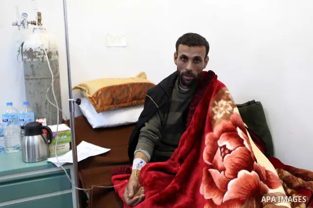 An injured anti-government protester receives treatment at a hospital in the eastern Libyan town of Derna on Feb. 23, 2011. Unrest shook Libya in recent days as government crackdowns on protesters have resulted in mass c...