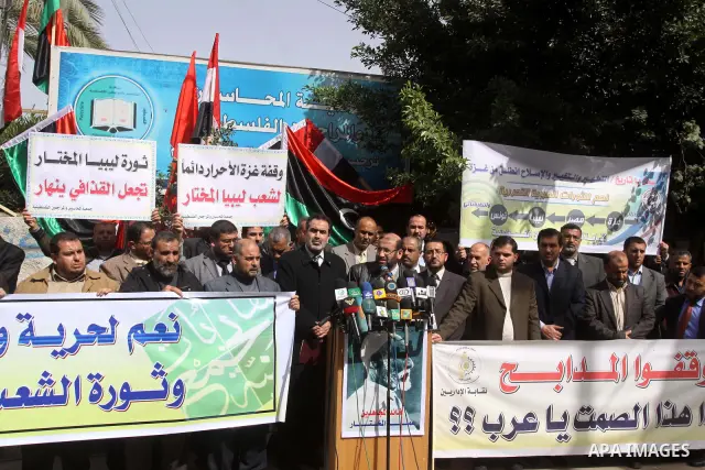 Palestinians take part in a protest to show solidarity with Libyan people, in Gaza city on Feb. 24, 2011. Photo by Mohammed Asad