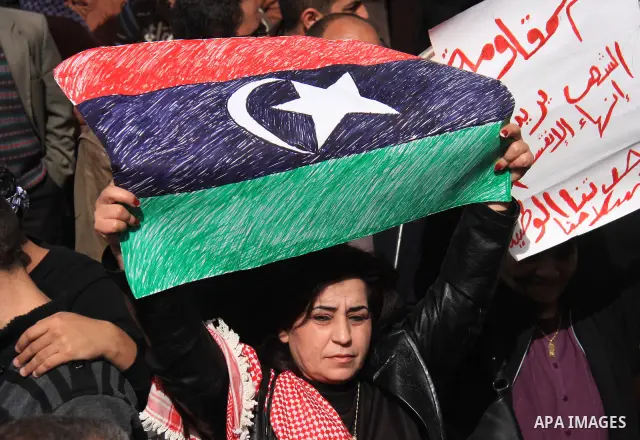 Palestinians take part in a rally against the U.S. veto and calling for the national reconciliation in the West Bank city of Nablus, Thursday, Feb. 24, 2011. Photo by Wagdi Eshtayah