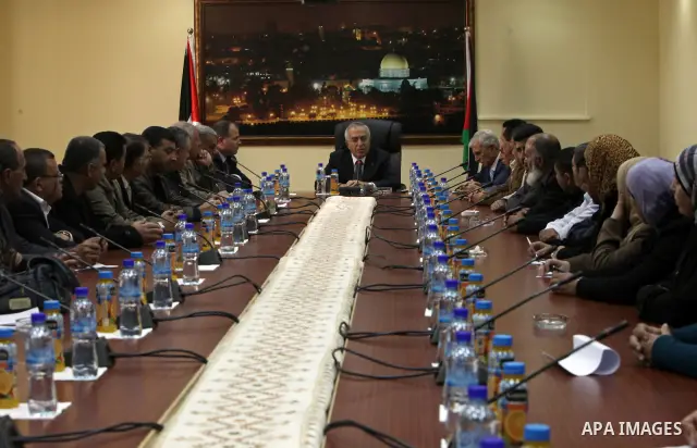 Palestinian prime minister Salam Fayyad, during a consultation meeting with representatives of the martyrs' families, about the formation of new government, in the West Bank City of Ramallah on Feb. 24, 2011. Photo by Mu...