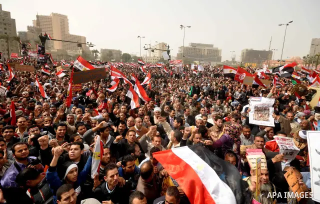 Egyptian protesters take part in a demonstration and Friday prayers in Tahrir Square, Cairo, Egypt, Friday, Feb. 25, 2011. Tens of thousands rallied in Cairo's Tahrir Square on Friday, trying to keep up pressure on Egypt...