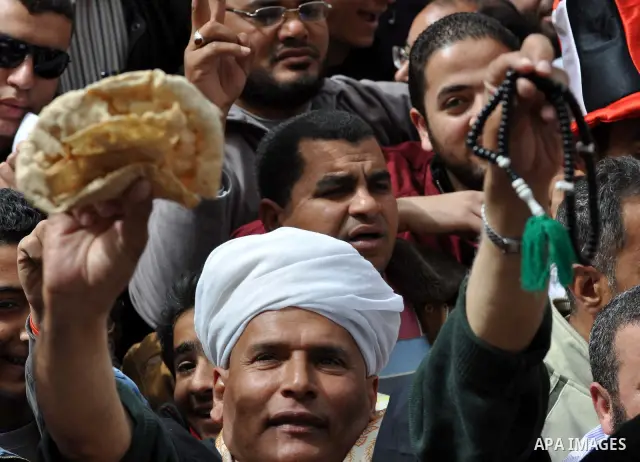Egyptian protesters take part in a demonstration and Friday prayers in Tahrir Square, Cairo, Egypt, Friday, Feb. 25, 2011. Tens of thousands rallied in Cairo's Tahrir Square on Friday, trying to keep up pressure on Egypt...