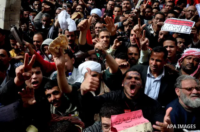 Egyptian protesters take part in a demonstration and Friday prayers in Tahrir Square, Cairo, Egypt, Friday, Feb. 25, 2011. Tens of thousands rallied in Cairo's Tahrir Square on Friday, trying to keep up pressure on Egypt...