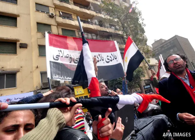 Egyptian protesters take part in a demonstration and Friday prayers in Tahrir Square, Cairo, Egypt, Friday, Feb. 25, 2011. Tens of thousands rallied in Cairo's Tahrir Square on Friday, trying to keep up pressure on Egypt...