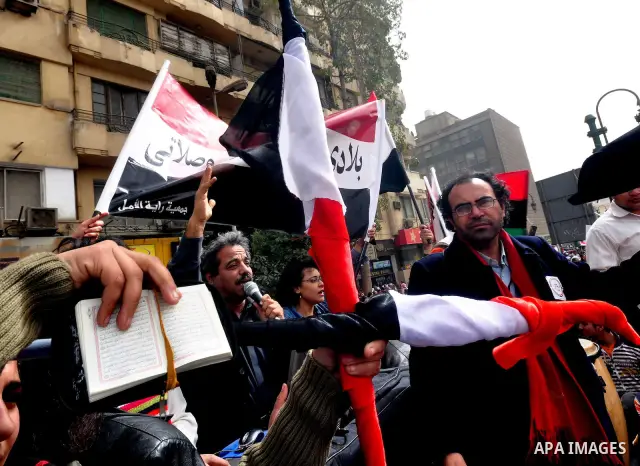 Egyptian protesters take part in a demonstration and Friday prayers in Tahrir Square, Cairo, Egypt, Friday, Feb. 25, 2011. Tens of thousands rallied in Cairo's Tahrir Square on Friday, trying to keep up pressure on Egypt...