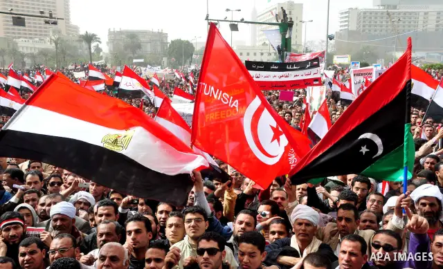 Egyptian protesters take part in a demonstration and Friday prayers in Tahrir Square, Cairo, Egypt, Friday, Feb. 25, 2011. Tens of thousands rallied in Cairo's Tahrir Square on Friday, trying to keep up pressure on Egypt...