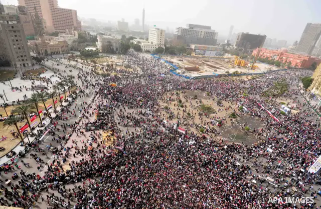 Egyptian protesters take part in a demonstration and Friday prayers in Tahrir Square, Cairo, Egypt, Friday, Feb. 25, 2011. Tens of thousands rallied in Cairo's Tahrir Square on Friday, trying to keep up pressure on Egypt...