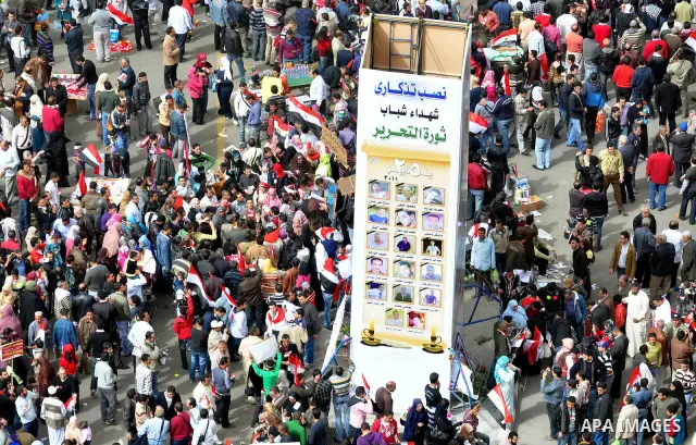 Egyptian protesters take part in a demonstration and Friday prayers in Tahrir Square, Cairo, Egypt, Friday, Feb. 25, 2011. Tens of thousands rallied in Cairo's Tahrir Square on Friday, trying to keep up pressure on Egypt...
