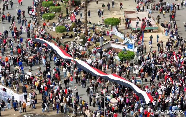 Egyptian protesters take part in a demonstration and Friday prayers in Tahrir Square, Cairo, Egypt, Friday, Feb. 25, 2011. Tens of thousands rallied in Cairo's Tahrir Square on Friday, trying to keep up pressure on Egypt...