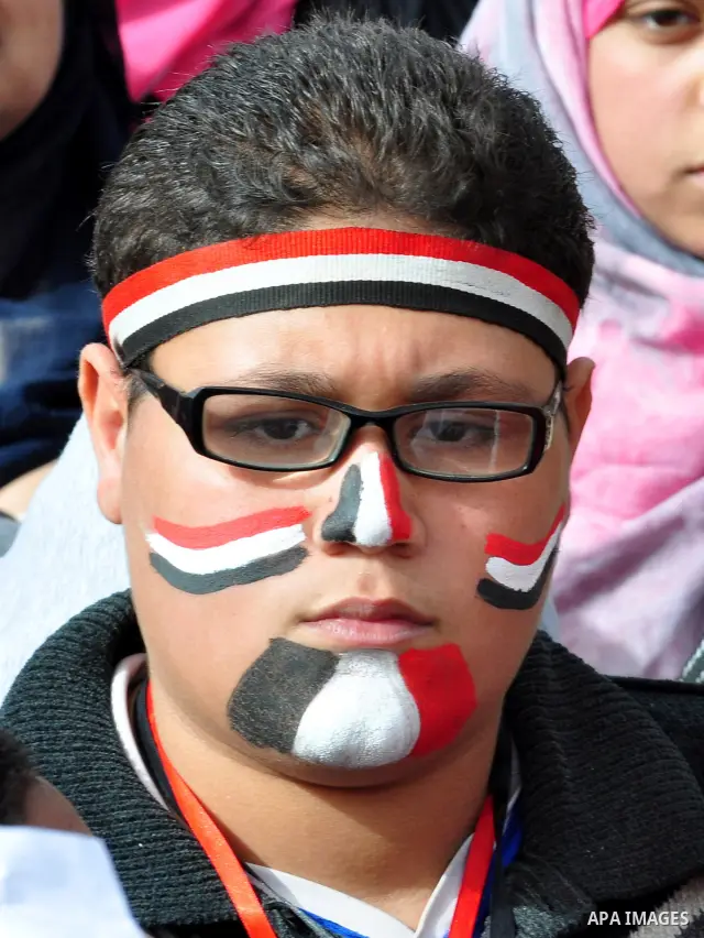 Egyptian protesters take part in a demonstration and Friday prayers in Tahrir Square, Cairo, Egypt, Friday, Feb. 25, 2011. Tens of thousands rallied in Cairo's Tahrir Square on Friday, trying to keep up pressure on Egypt...