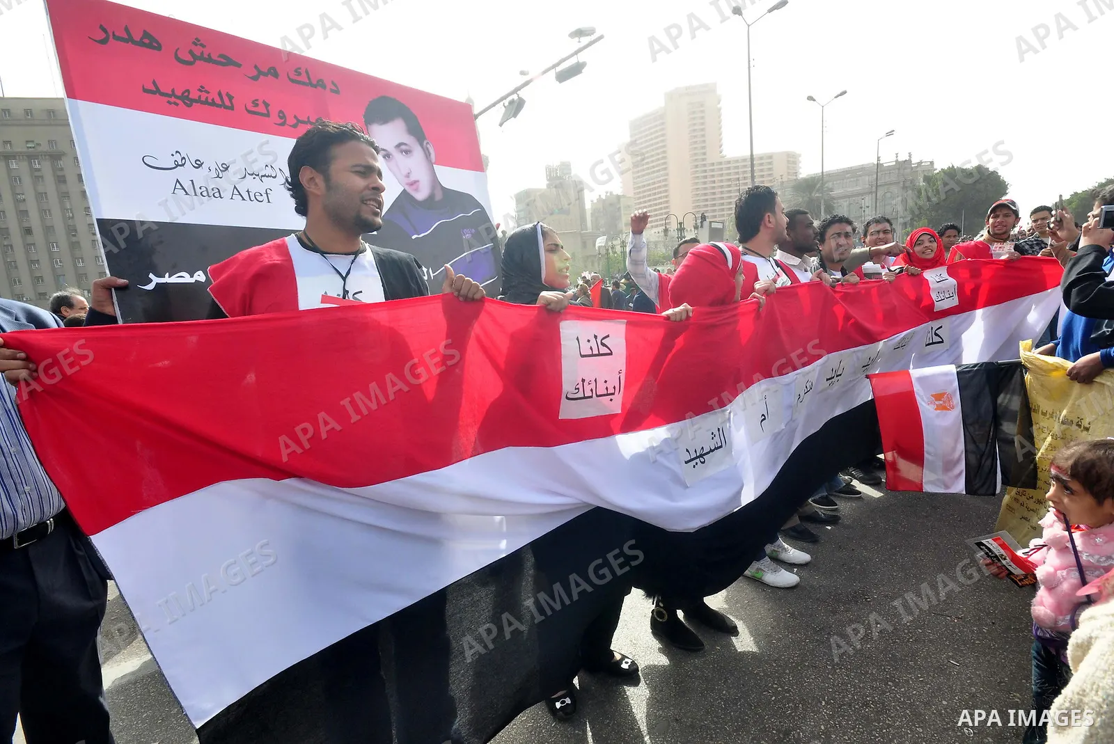 Egyptian protesters take part in a demonstration and Friday prayers in Tahrir Square, Cairo, Egypt, Friday, Feb. 25, 2011. Tens of thousands rallied in Cairo's Tahrir Square on Friday, trying to keep up pressure on Egypt...