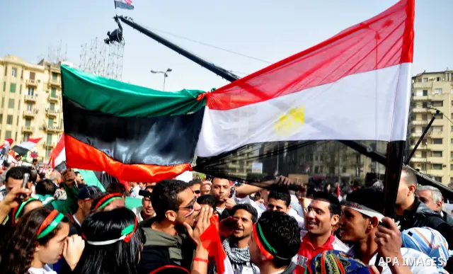 Egyptian protesters take part in a demonstration and Friday prayers in Tahrir Square, Cairo, Egypt, Friday, Feb. 25, 2011. Tens of thousands rallied in Cairo's Tahrir Square on Friday, trying to keep up pressure on Egypt...