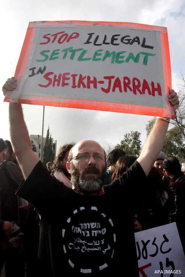 Israeli left-wing activists participate in a demonstration supporting Palestinians evicted from their homes in the east Jerusalem neighborhood of Sheikh Jarrah, Friday, Feb 25, 2011. Photo by Mahfuz Abu Turk