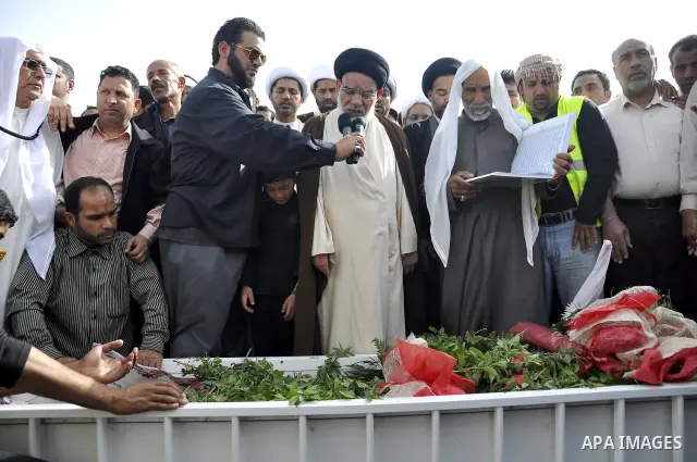 Anti-monarchy protesters and relatives accompany the coffin with the corpse of protester Abdul Redha Mohammed Hassan, 32, who was shot in the head by security forces while trying to march to Pearl Square, during the buri...