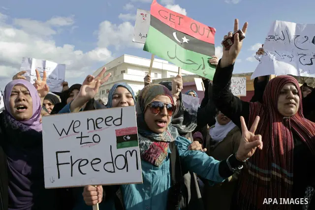 Libyan protesters demonstrate against Libyan leader Moammar Gadhafi during a rally at the Court Square in Derna, Libya, on Feb. 25, 2011. Photo by Karam Nasser