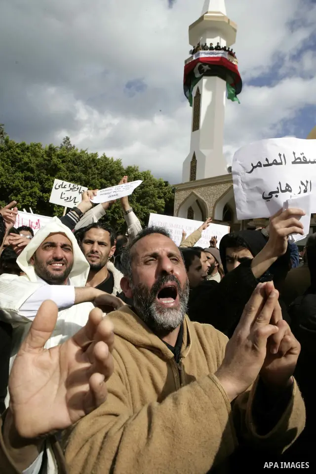 Libyan protesters demonstrate against Libyan leader Moammar Gadhafi during a rally at the Court Square in Derna, Libya, on Feb. 25, 2011. Photo by Karam Nasser
