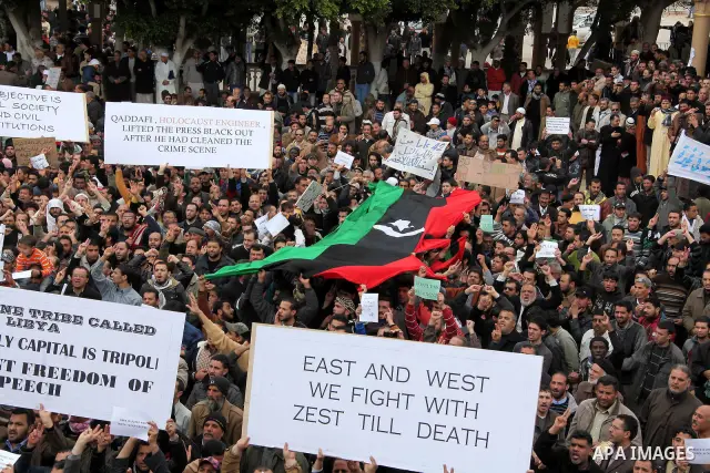 Libyan protesters demonstrate against Libyan leader Moammar Gadhafi during a rally at the Court Square in Derna, Libya, on Feb. 25, 2011. Photo by Karam Nasser