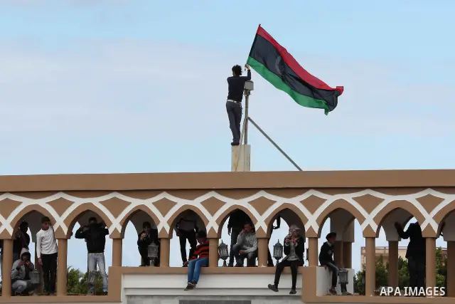 Libyan protesters demonstrate against Libyan leader Moammar Gadhafi during a rally at the Court Square in Derna, Libya, on Feb. 25, 2011. Photo by Karam Nasser
