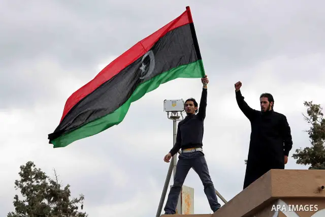 Libyan protesters demonstrate against Libyan leader Moammar Gadhafi during a rally at the Court Square in Derna, Libya, on Feb. 25, 2011. Photo by Karam Nasser