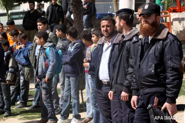 Members of Palestinian policemen in Gaza Strip, participate in campaign to provide services to the citizen, Gaza City on Feb. 26, 2011. Photo by Mohammed Asad