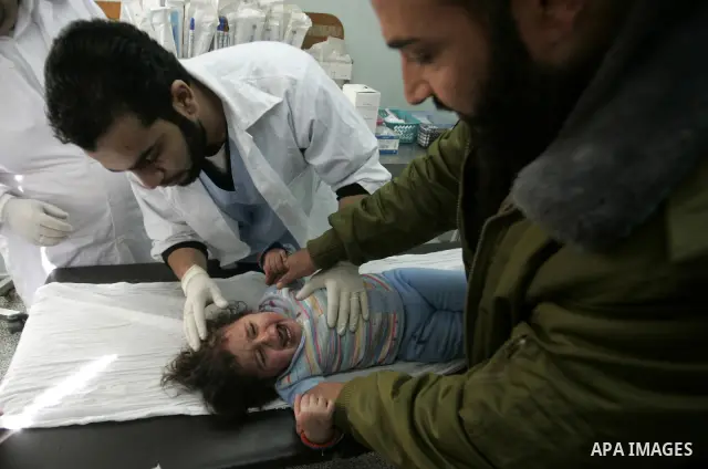 A Palestinian girl cries as she receives a treatment after she was wounded in Israeli air raid, at a hospital in the southern Gaza Strip town of Rafah, on Feb. 26, 2011. Israeli aircraft attacked two military sites of th...