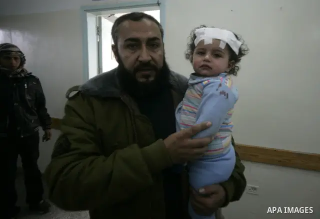 A Palestinian girl cries as she receives a treatment after she was wounded in Israeli air raid, at a hospital in the southern Gaza Strip town of Rafah, on Feb. 26, 2011. Israeli aircraft attacked two military sites of th...