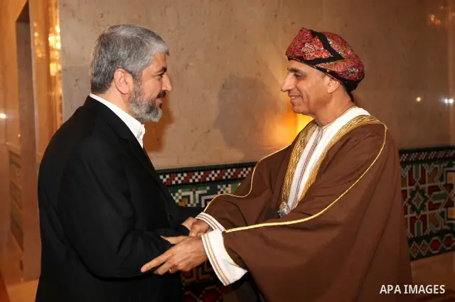 Palestinian Hamas leader Khaled Meshaal, (L), during a meeting the deputy prime minister of the Sultanate of Oman, Fahd bin Mahmoud al Said, (R), in Sultanate of Oman on Feb. 26, 2011. Photo by Majd Majd