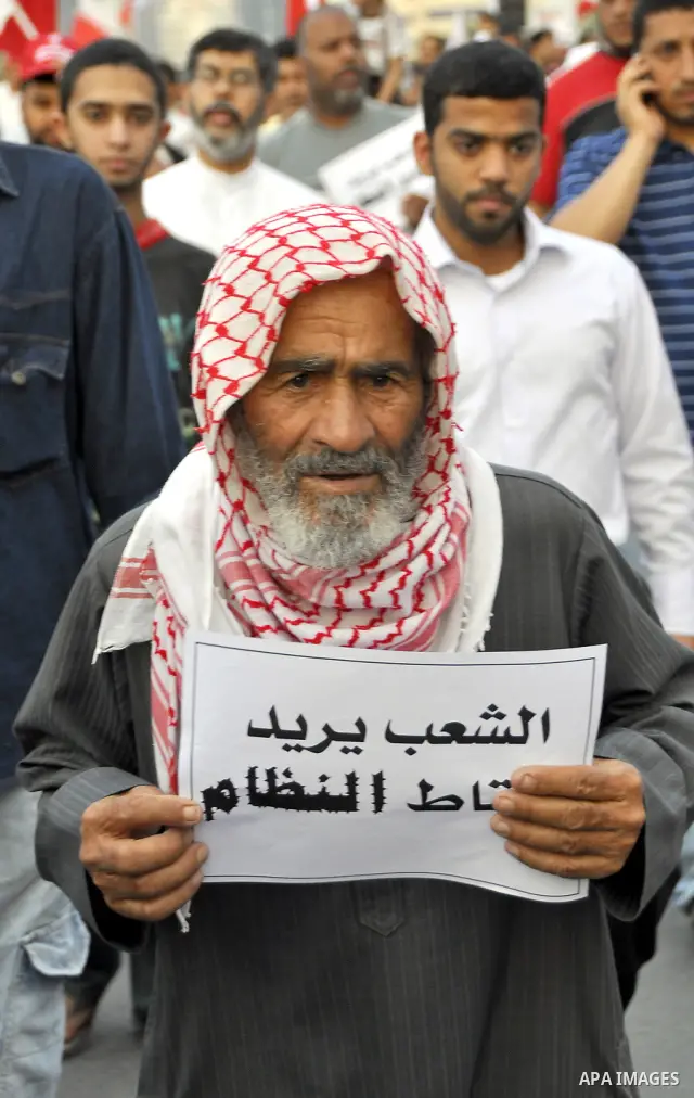 Bahraini Shiite anti-government protesters demonstrate in the streets of Manama on February 27, 2011. Eighteen Bahraini MPs from Al-Wefaq Shiite opposition bloc officially submitted their letter of resignation to protest...