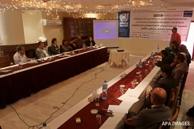 Palestinians attend a meeting to discuss the challenges for local media in producing humanitarian and recovery information for adults and children, in Gaza City on Feb. 28, 2011. Photo by Mohammed Asad