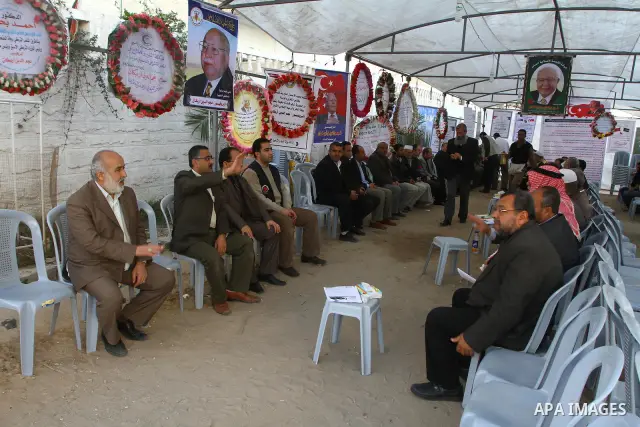 Palestinians offer the condolences on the death of the Turkish leader, Necmettin Erbakan in Gaza city on Feb. 28,2011. Photo by Ashraf Amra