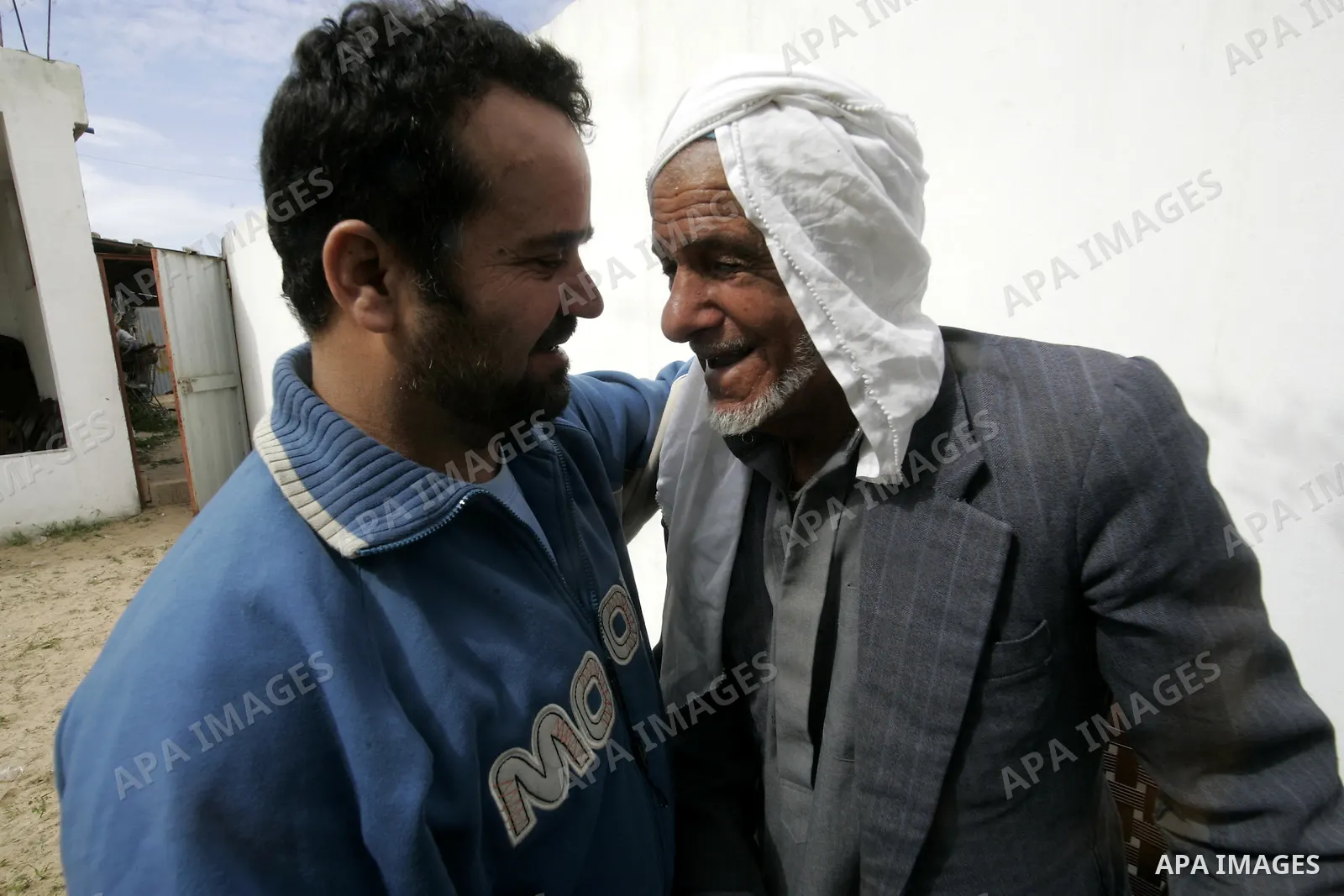 Palestinian prisoner Nabil Mansour al-Bashiti, 49 years, is welcomed by relatives after his arrival to his home in Khan Younis in the southern Gaza Strip on March 01, 2011. Egyptian authorities released al-Bashiti after...
