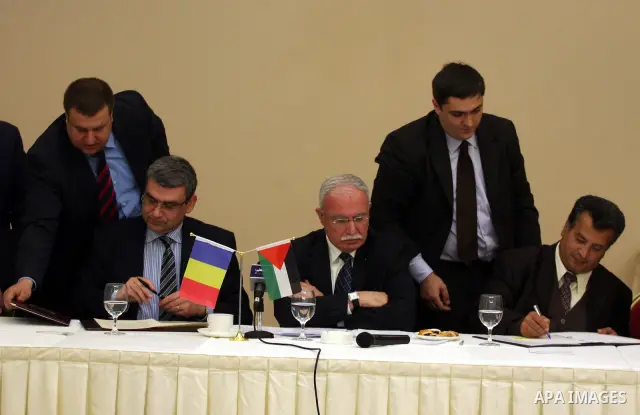 Palestinian Foreign Minister, Riyad al-Malki and the Romanian Foreign Minister, Teodor Baconschi attend a meeting in the West Bank city of Ramallah on March 1, 2011. Photo by Issam Rimawi