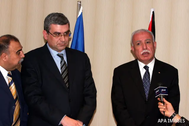 Palestinian Foreign Minister, Riyad al-Malki and the Romanian Foreign Minister, Teodor Baconschi deliver speech during a press conference in the West Bank city of Ramallah on March 1, 2011. Photo by Issam Rimawi