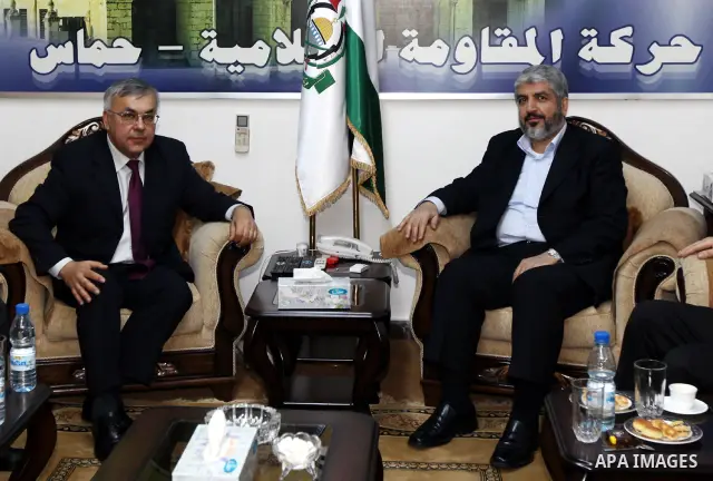 The head of the Hamas political bureau, Khaled Mashaal meets with the Russia envoy, Sergei Frishinin in Damascus on March. 1,2011. Photo by STR