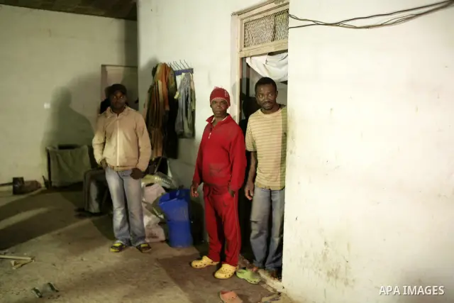 African migrant workers living in miserable conditions in Benghazi March 1, 2011. African workers fear attacks from Libyans hunting for alleged mercenary fighters. Wealthier Western and Asian states have sent ships to ev...