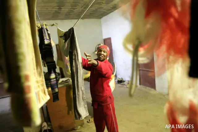 African migrant workers living in miserable conditions in Benghazi March 1, 2011. African workers fear attacks from Libyans hunting for alleged mercenary fighters. Wealthier Western and Asian states have sent ships to ev...
