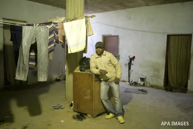 African migrant workers living in miserable conditions in Benghazi March 1, 2011. African workers fear attacks from Libyans hunting for alleged mercenary fighters. Wealthier Western and Asian states have sent ships to ev...