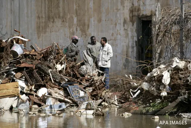 African migrant workers living in miserable conditions in Benghazi March 1, 2011. African workers fear attacks from Libyans hunting for alleged mercenary fighters. Wealthier Western and Asian states have sent ships to ev...