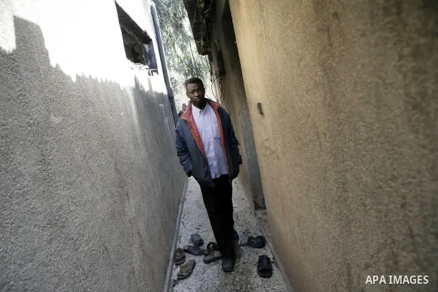 African migrant workers living in miserable conditions in Benghazi March 1, 2011. African workers fear attacks from Libyans hunting for alleged mercenary fighters. Wealthier Western and Asian states have sent ships to ev...