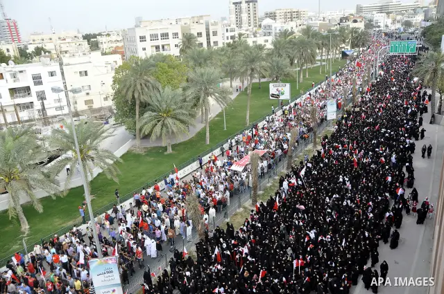 Bahraini protesters march in the capital Manama, Bahrain, 01 March 2011. Thousands of protesters took part in an opposition rally from within the capital Manama, Bahrain to Lulu Square to renew demands for removing the g...