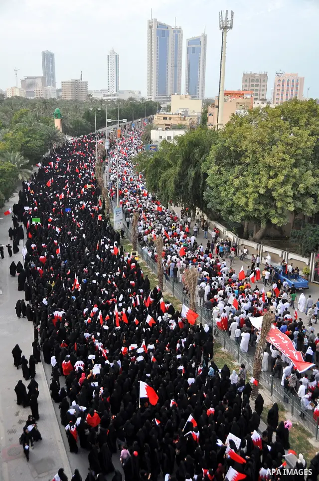 Bahraini protesters march in the capital Manama, Bahrain, 01 March 2011. Thousands of protesters took part in an opposition rally from within the capital Manama, Bahrain to Lulu Square to renew demands for removing the g...