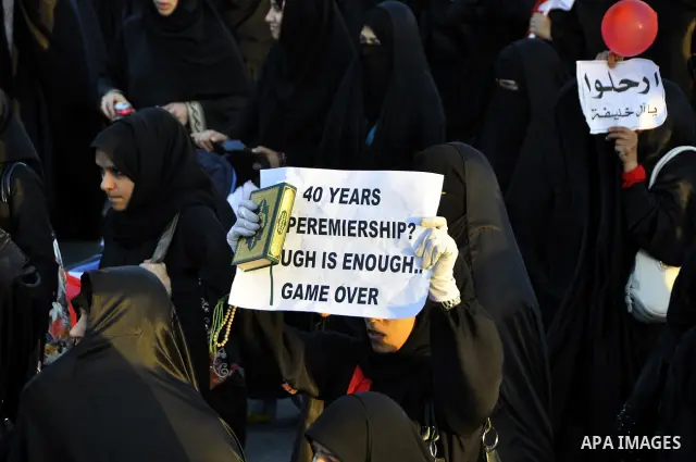 Protesters demonstrate in front of the Interior Ministry in Manama, capital of Bahrain, March 2, 2011. Anti-government protesters turned up in hundreds here on Wednesday, calling for the release of remaining political pr...